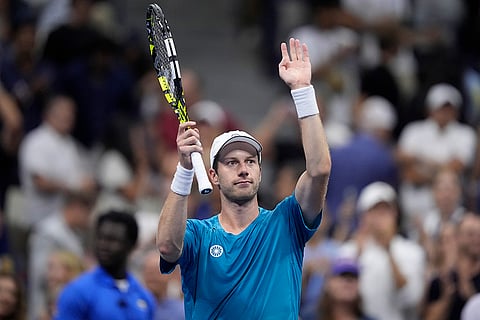 US Open 2024: Botic van De Zandschulp, of the Netherlands, reacts after defeating Carlos Alcaraz, of Spain
